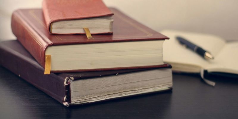 A stack of leather bound books and documentation. New changes to the Family Procedure Rules—Today’s Family Lawyer
