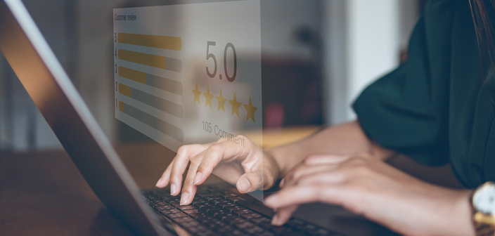 Russell-Cooke client feedback. Images of hands and laptop with a transparent overlay showing a webpage review