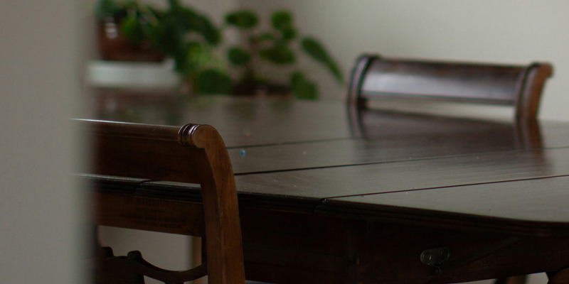 A dining room table in someone's home. Facilitating a settlement—which table and who should be seated?