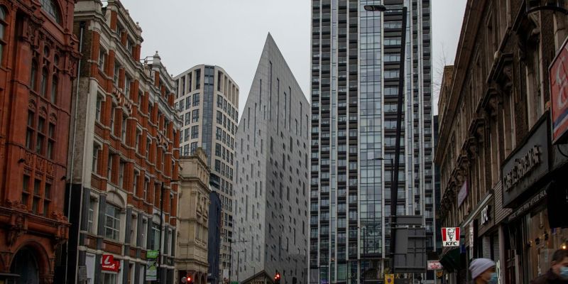 Modern high rise buildings located next to traditional buildings in central London. Building Better—The Law Society Gazette