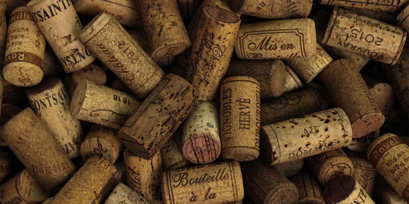 An assortment of wine corks. Russell-Cooke advises Coterie Holdings on acquisition of Hallgarten & Novum Wines