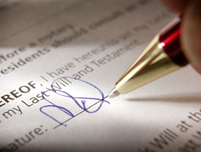 The signing of a last will and testament. WInning with a will