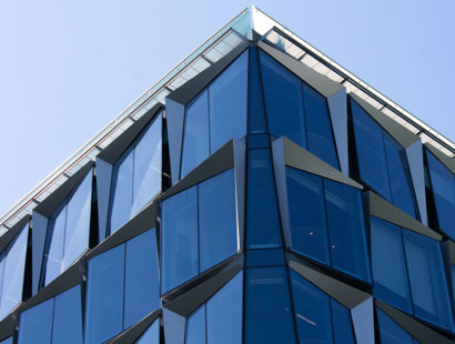 Real Estate Legal News—October 2023: Corporate building with glass windows