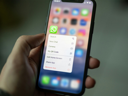 A person holding a phone with whatsapp messages. Lessons from the Post Office and Covid Inquiry—how recent scandals highlight disclosure issues in litigation