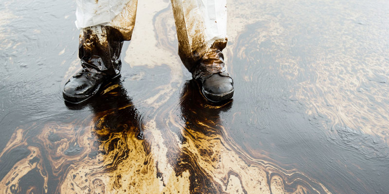 Russell-Cooke real estate disputes. Image of oil spill on land